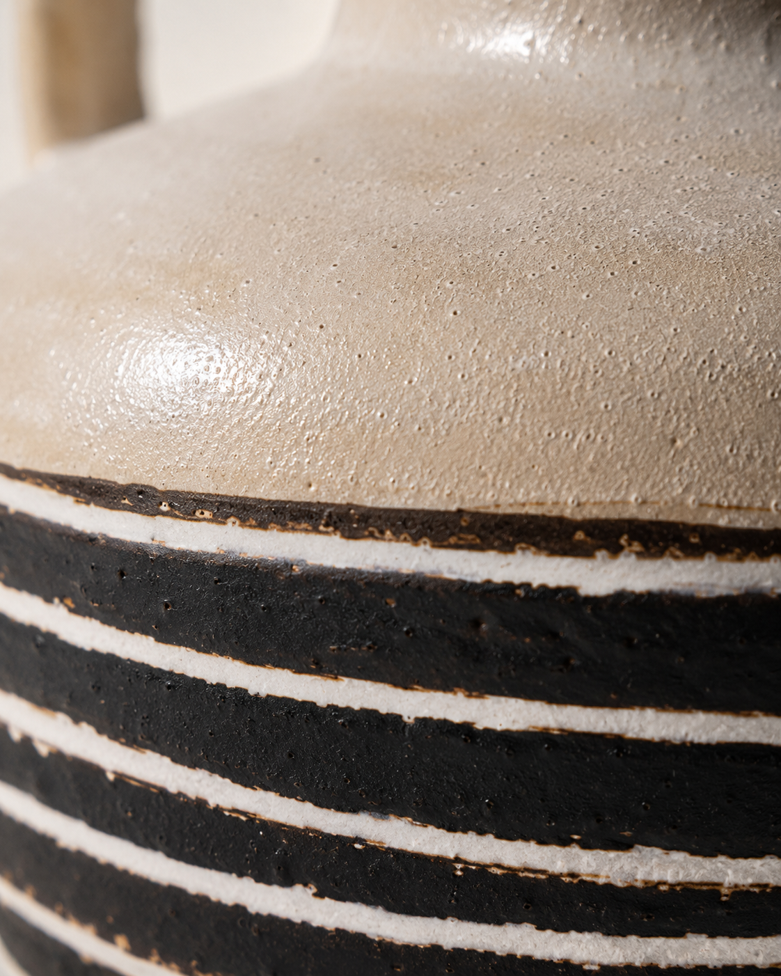 Romy Stripe Vase close-up showing two open side handles