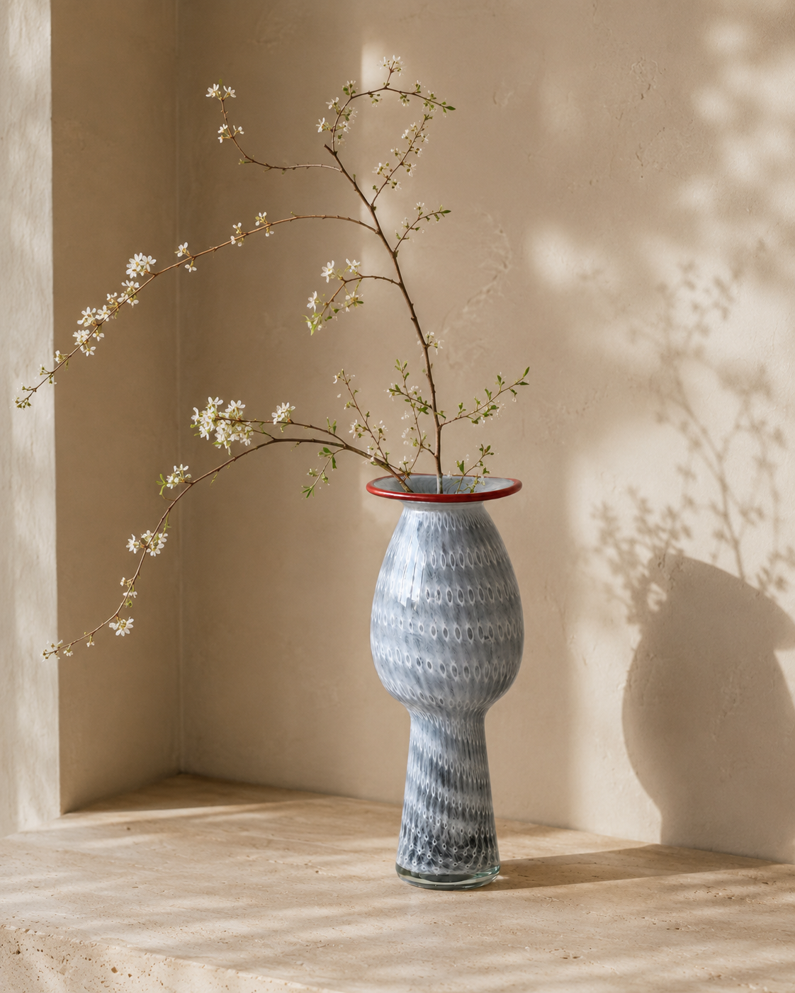 Alea Red-Rim Vase with stems on a tabletop