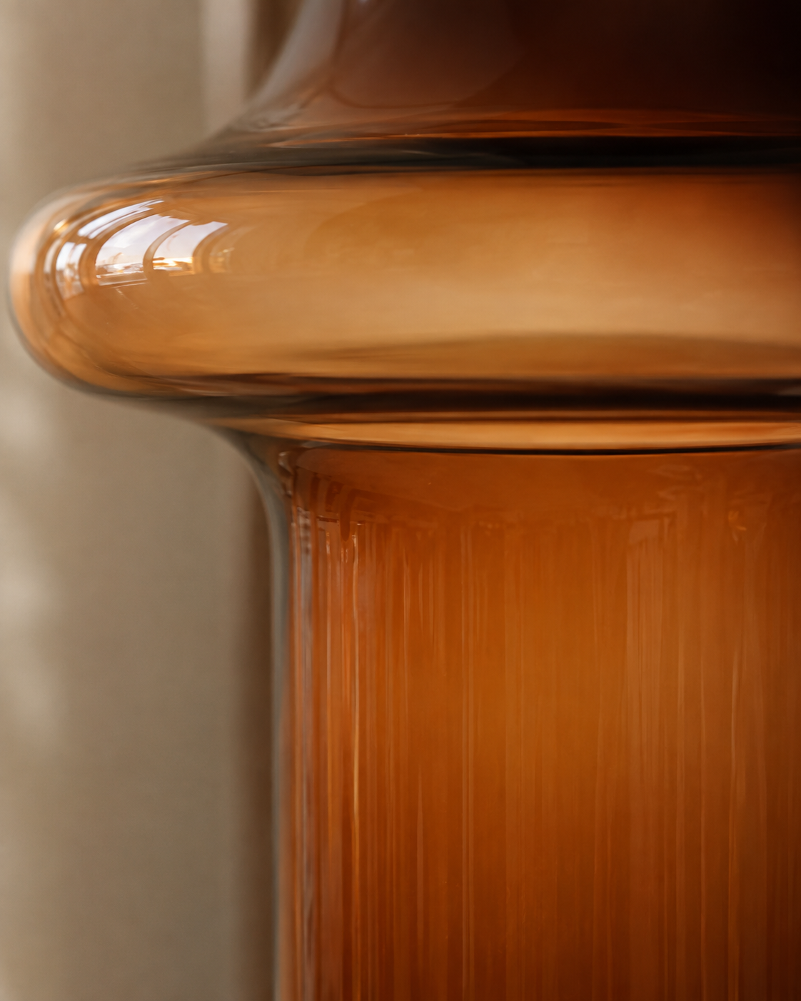 Luna Collar Vase close-up showing amber body and darker neck