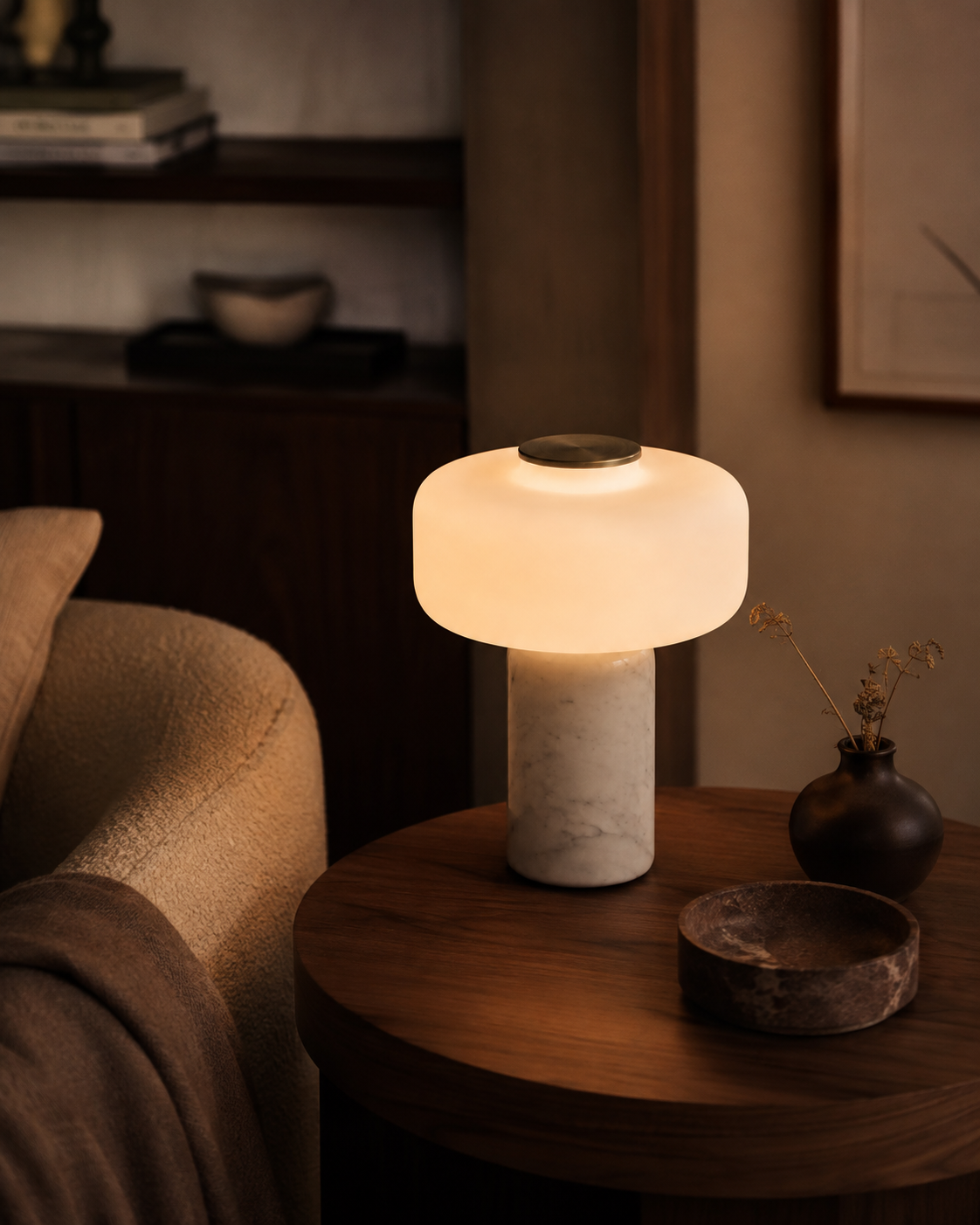 Perrine Sculptural Table Lamp glowing in an evening interior