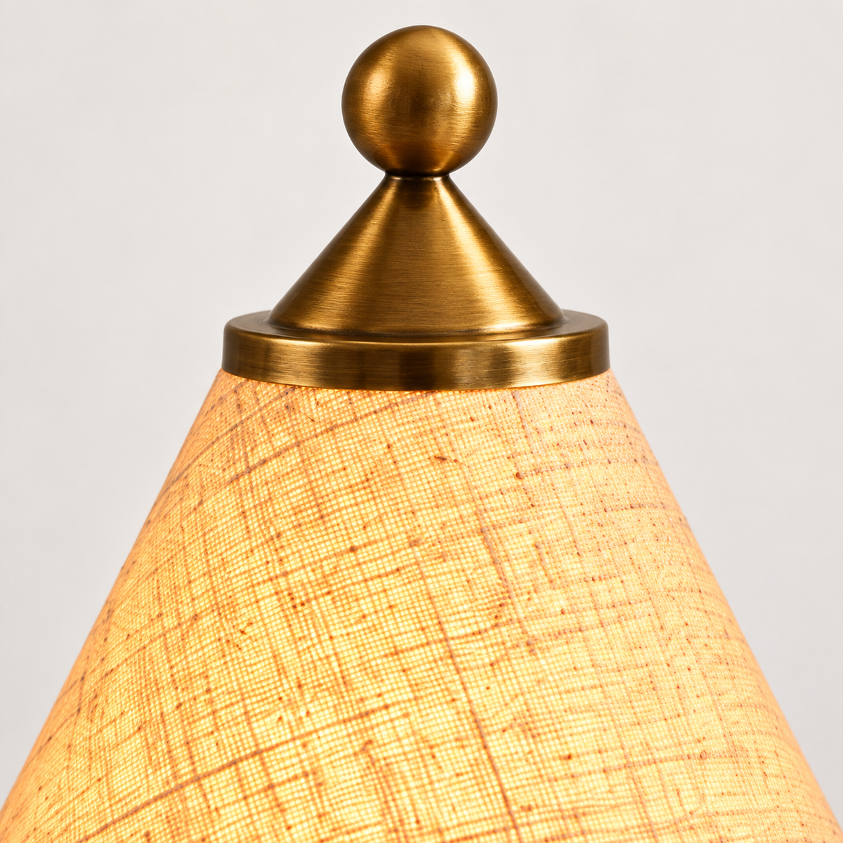 Tova Wood Table Lamp brass-colored finial above the tapered shade