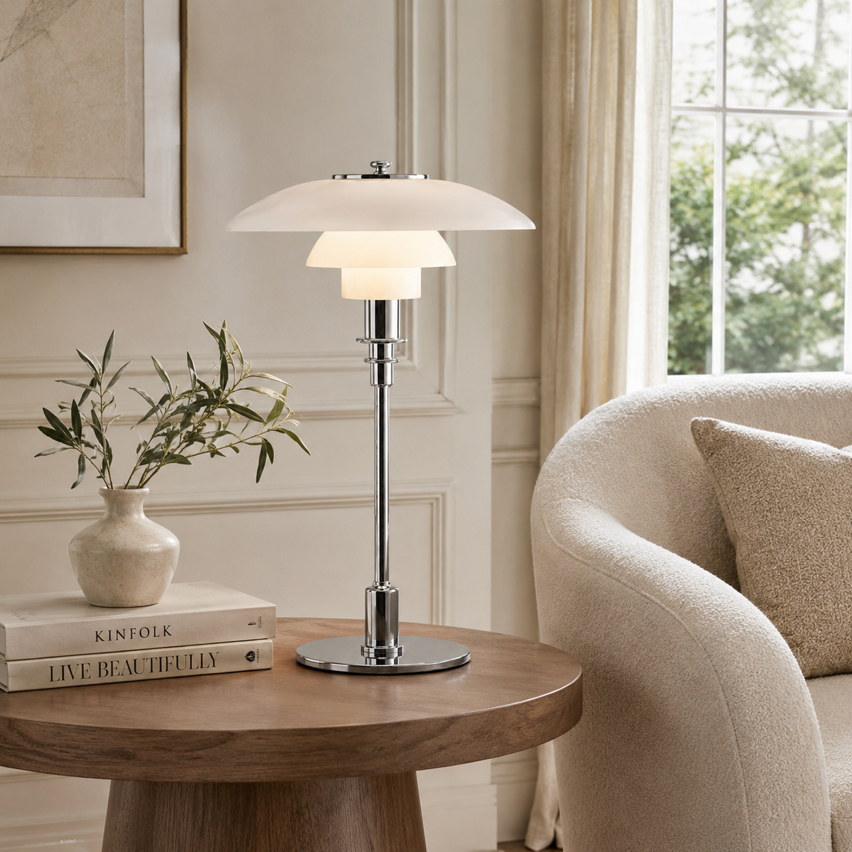 Rielle Sculptural Table Lamp on a side table in a living room