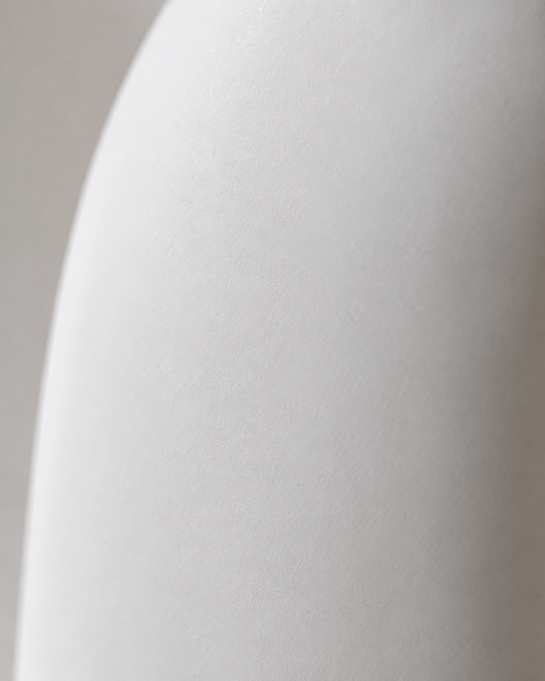 Luna Loop Vase close-up showing white finish