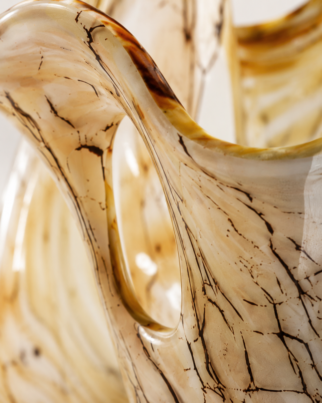 Eden Crest Vase close-up showing pale body with fine dark linework