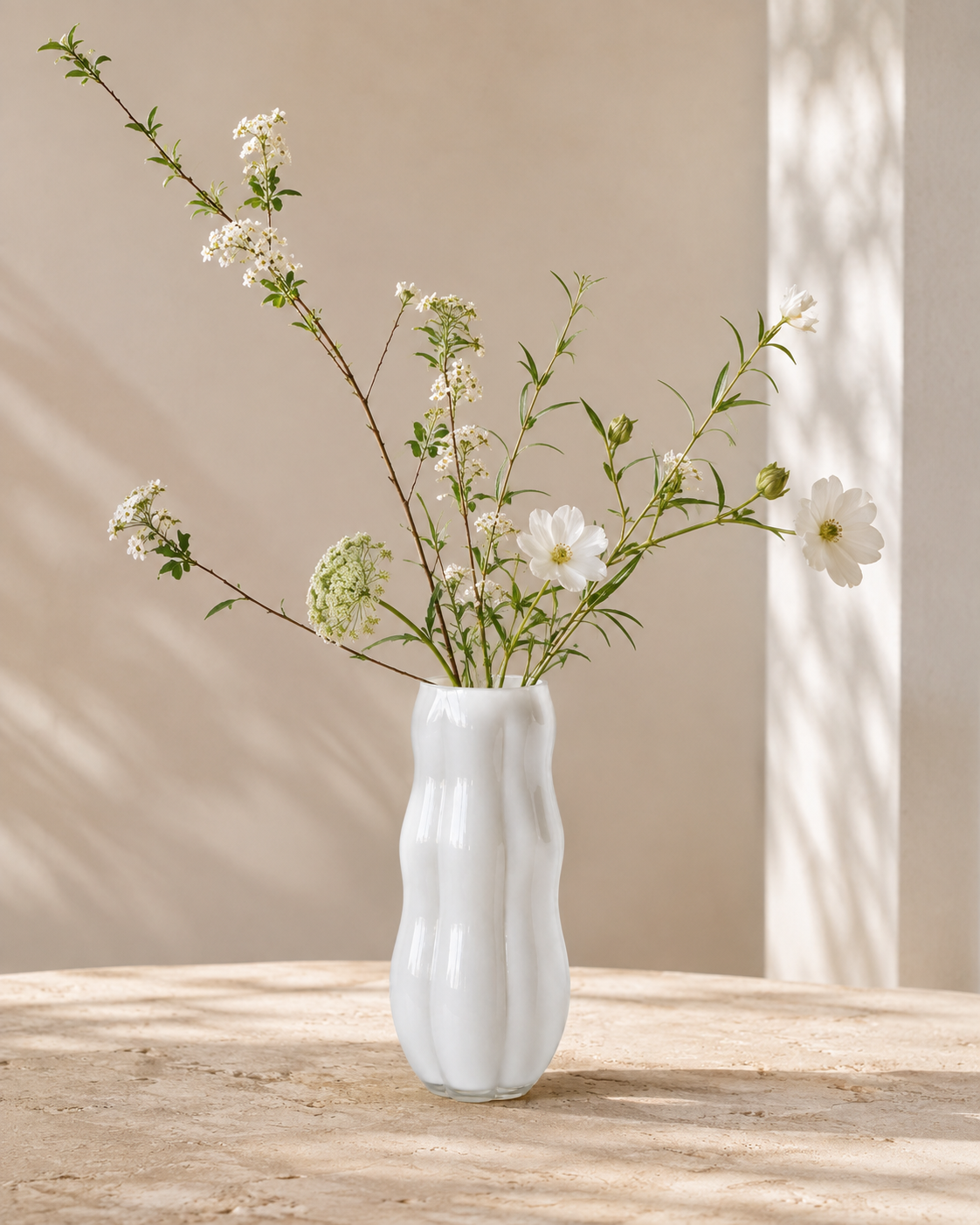 Alea Softline Vase with stems on a tabletop