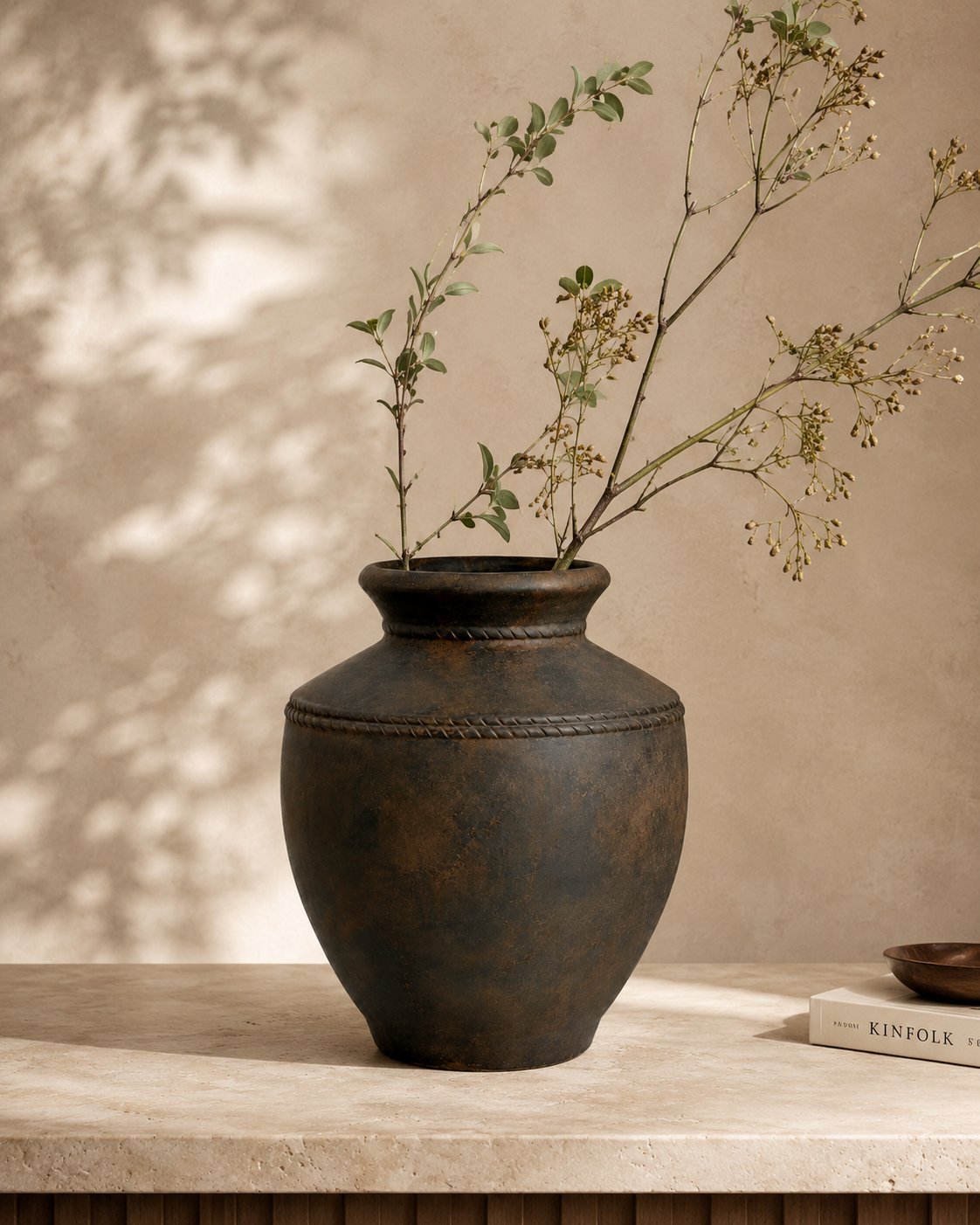 Olia Banded Vase with stems on a tabletop