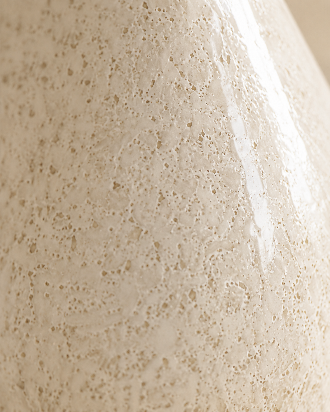 Alea Tilt Vase close-up showing pale surface with fine speckles