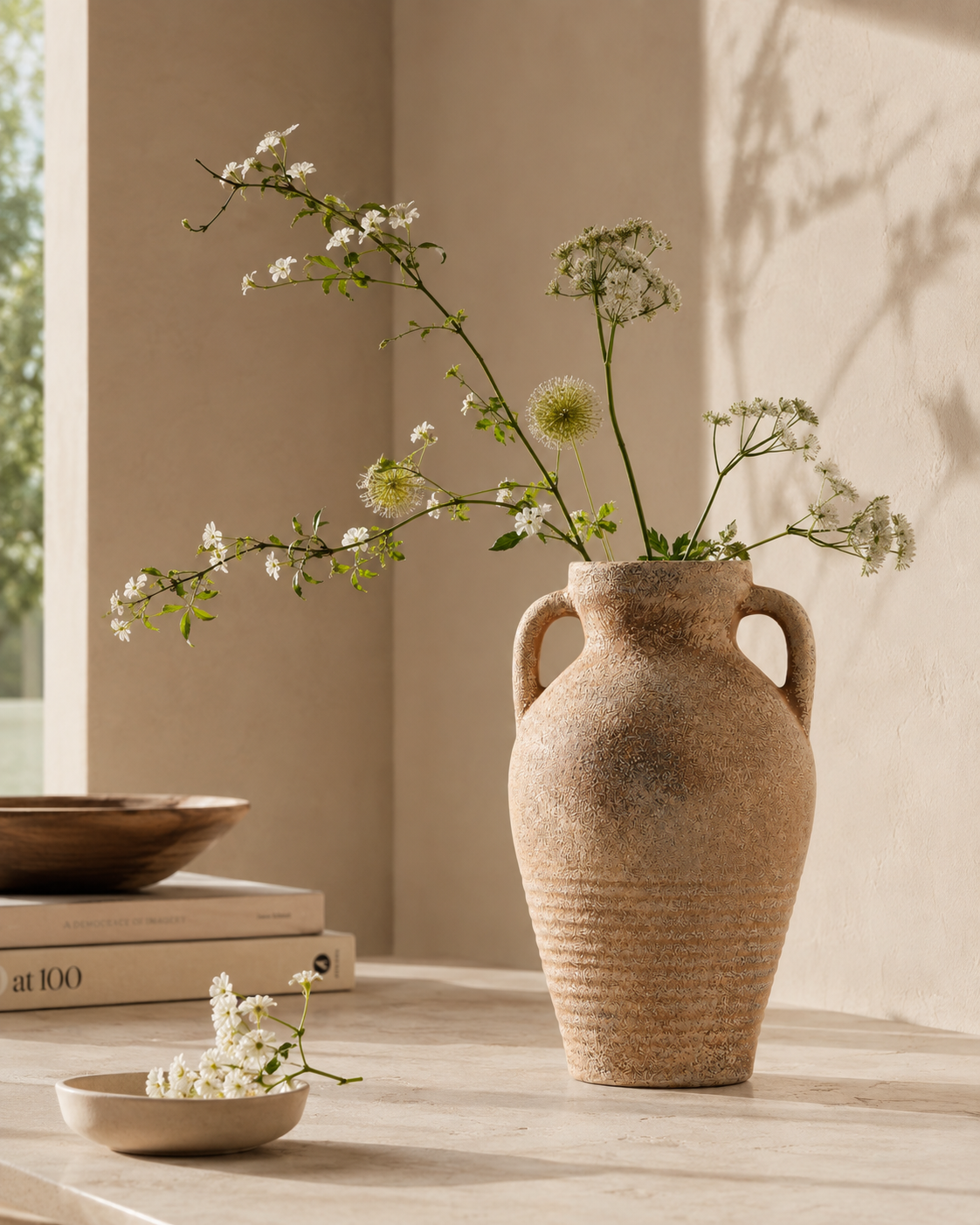 Mina Amphora Vase with stems on a tabletop
