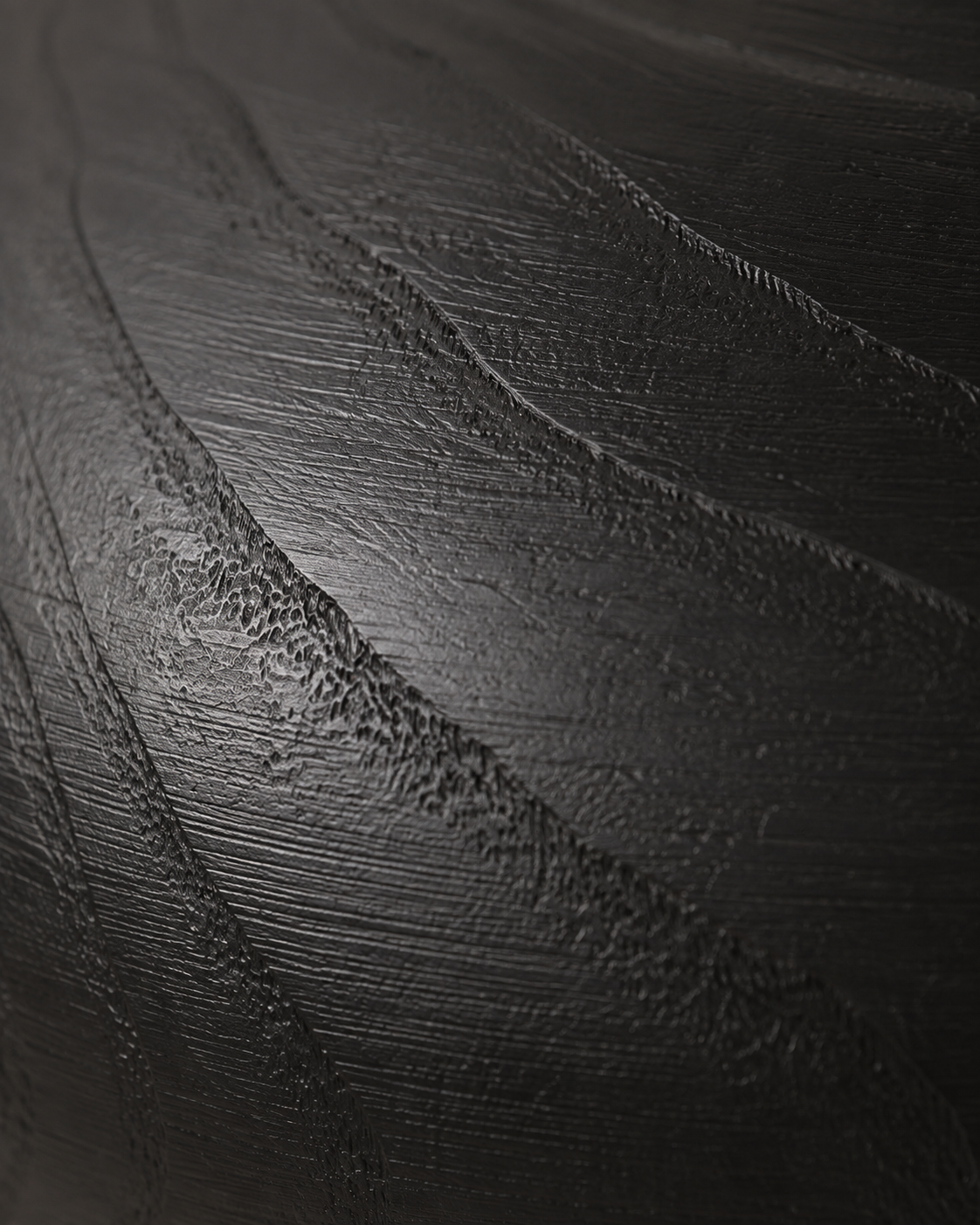 Evia Orbit Vase close-up showing sweeping diagonal surface lines