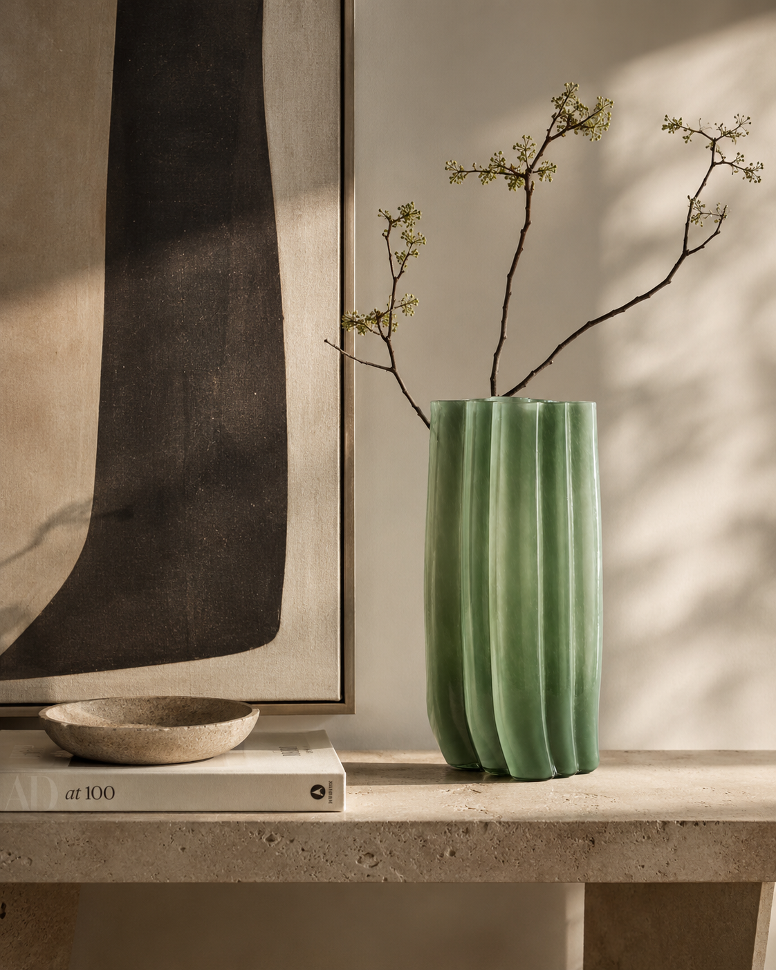 Mina Reed Vase on a console