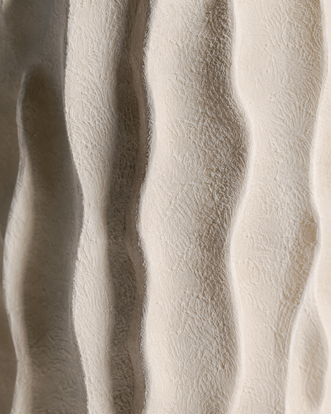 Sora Fold Vase close-up showing deep irregular vertical folds