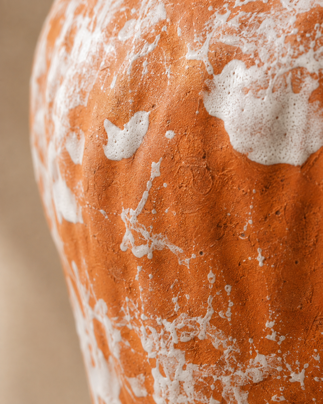 Olia Sienna Vase close-up showing irregular pale surface patches