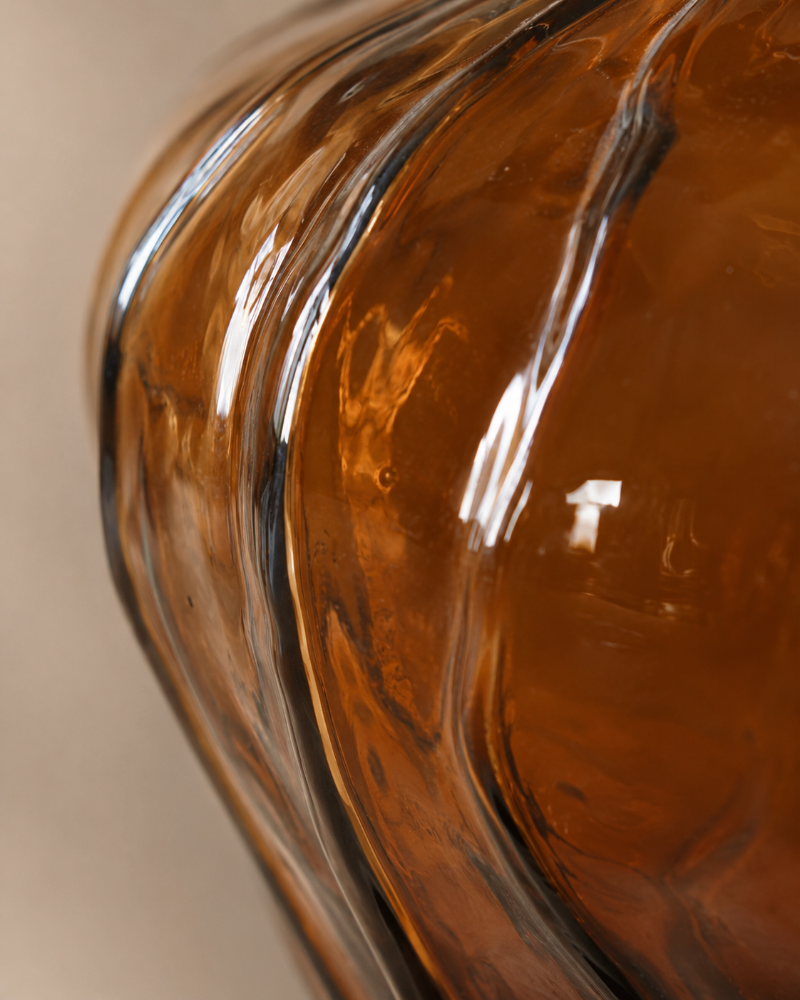 Mina Amber Vase close-up showing vertical folds along the body