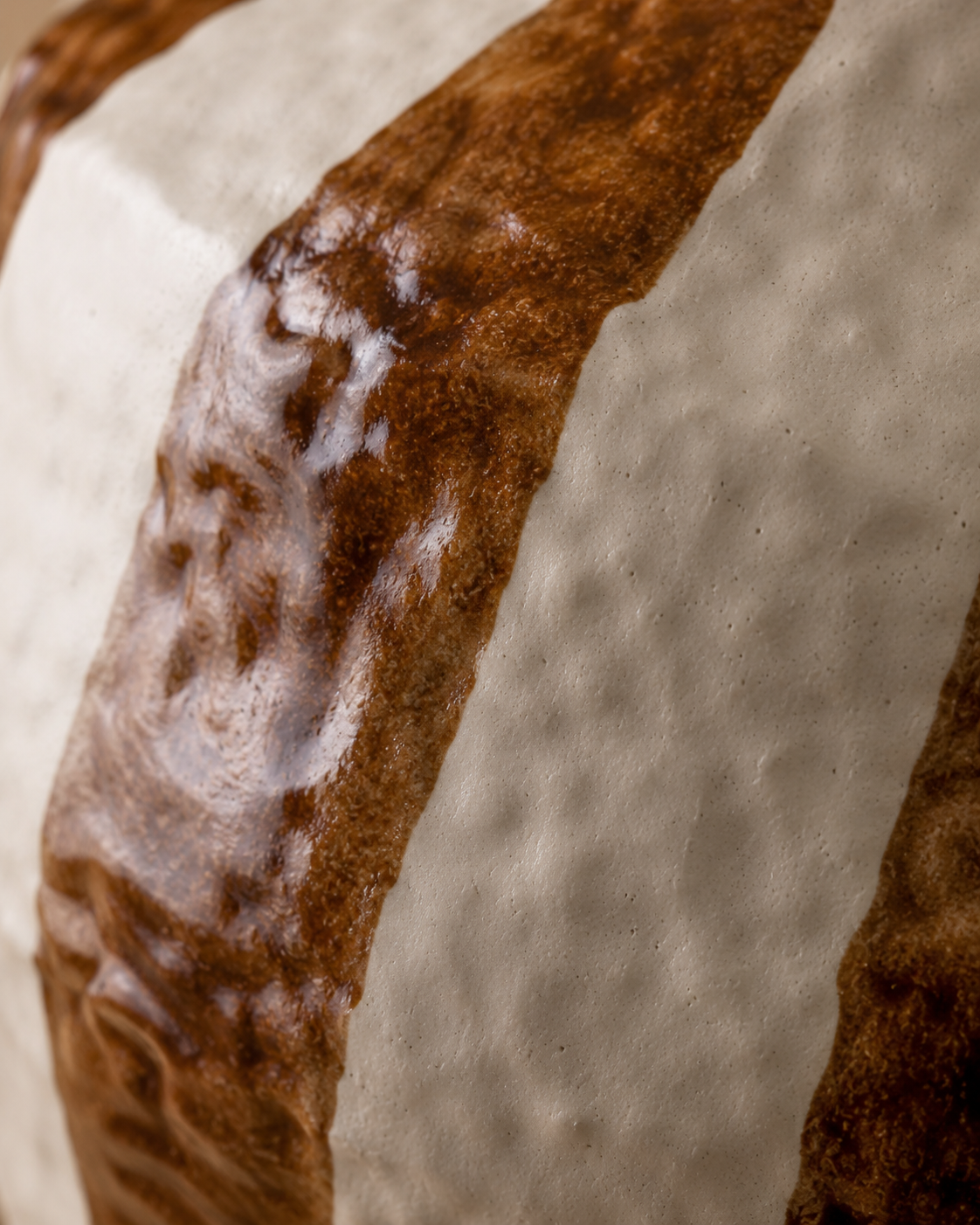 Evia Stripe Vase close-up showing wide brown and cream vertical bands