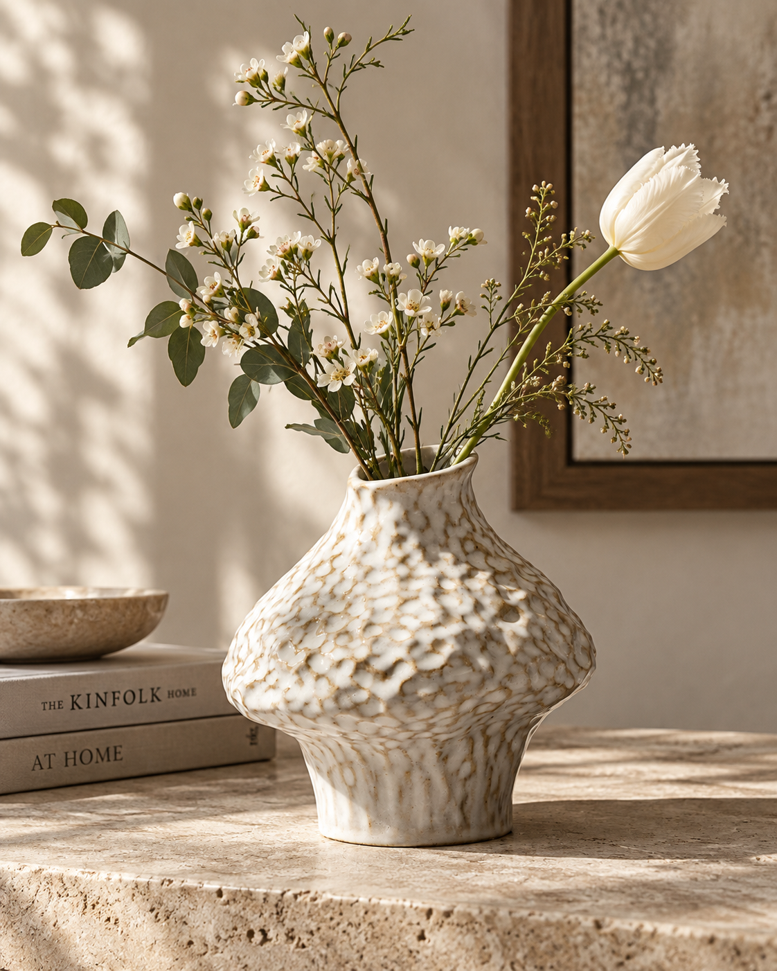 Riva Canopy Vase with stems on a tabletop