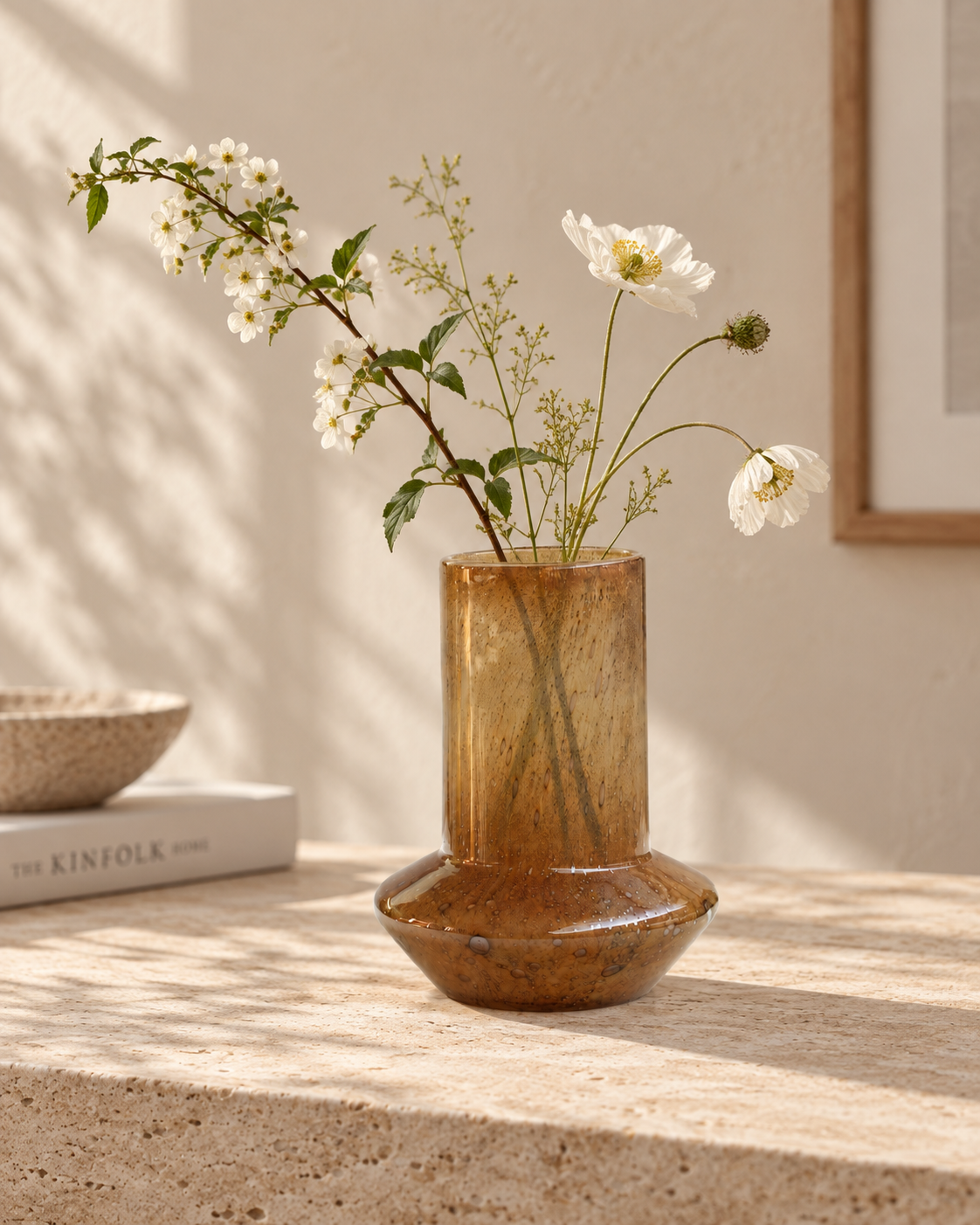 Thea Column Vase with stems on a tabletop