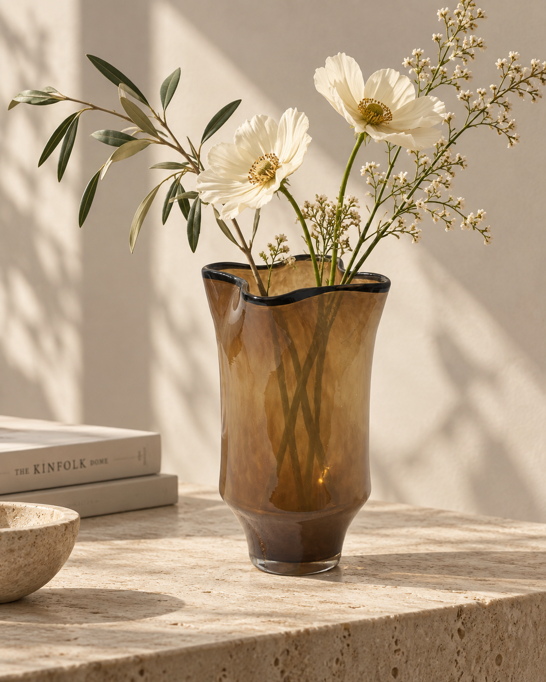 Luna Wave Vase with stems on a tabletop