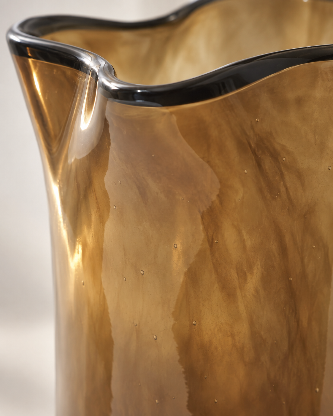 Luna Wave Vase close-up showing softly mottled amber-brown color